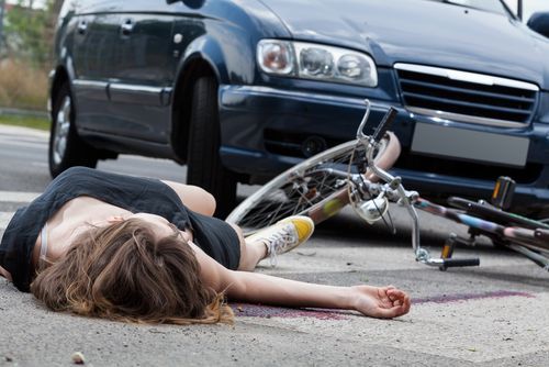 Aftermath of a bicycle rider being struck by a motor vehicle