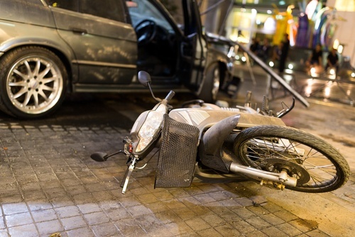 Aftermath of an accident between a car and a motorcycle - victims in Colorado can bring a lawsuit for damages