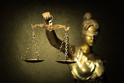 Scale of justice. It indicates plaintiffs have a 51% burden of proof. 